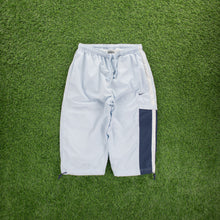 Load image into Gallery viewer, (2004) Women’s Nike Small Swoosh Embroidered Pocket Taping Adjustable Light Blue 3/4 Length Shorts - M (30-33”)