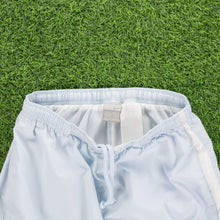 Load image into Gallery viewer, (2004) Women’s Nike Small Swoosh Embroidered Pocket Taping Adjustable Light Blue 3/4 Length Shorts - M (30-33”)