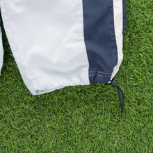 Load image into Gallery viewer, (2004) Women’s Nike Small Swoosh Embroidered Pocket Taping Adjustable Light Blue 3/4 Length Shorts - M (30-33”)