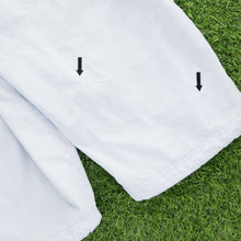 Load image into Gallery viewer, (2004) Women’s Nike Small Swoosh Embroidered Pocket Taping Adjustable Light Blue 3/4 Length Shorts - M (30-33”)