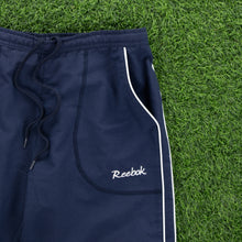 Load image into Gallery viewer, Women’s Reebok Small Spell Out Embroidered Pocket Piping Adjustable Navy 3/4 Length Shorts - M (10)