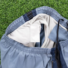 Load image into Gallery viewer, Nike Small Swoosh Embroidered Mesh Stripe Light Blue Sports Shorts - M (28-32”)