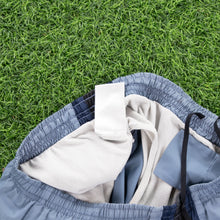 Load image into Gallery viewer, Nike Small Swoosh Embroidered Mesh Stripe Light Blue Sports Shorts - M (28-32”)