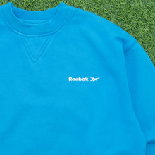 Load image into Gallery viewer, Reebok Essentials Small Spell Out Logo Embroidered Oversized Boxy Crewneck Turquoise Blue Sweatshirt - S/M
