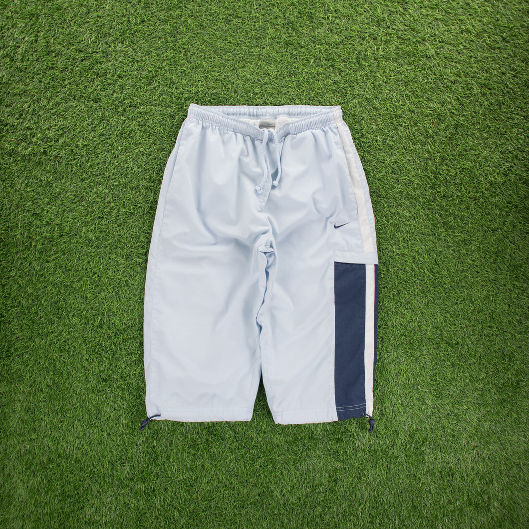(2004) Women’s Nike Small Swoosh Embroidered Pocket Taping Adjustable Light Blue 3/4 Length Shorts - M (30-33”)