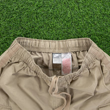 Load image into Gallery viewer, (2007) Nike Randall’s Island Downing Stadium Small Swoosh Embroidered Cream Cargo Shorts - L (32-36”)
