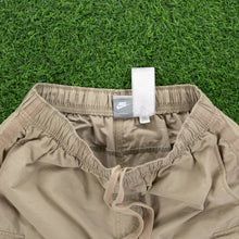 Load image into Gallery viewer, (2007) Nike Randall’s Island Downing Stadium Small Swoosh Embroidered Cream Cargo Shorts - L (32-36”)
