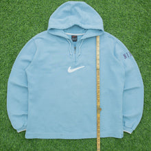 Load image into Gallery viewer, Women’s 1999 Nike Large Swoosh Sleeve Spell Out Embroidered Boxy 1/4 Quarter Zip Light Blue Hoodie - M (10-12)
