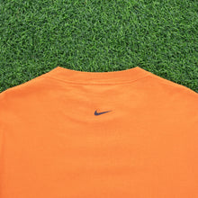 Load image into Gallery viewer, (1997) Nike Tiger Woods Golf Large Spell Out Graphic Orange T-Shirt - M/L
