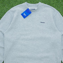 Load image into Gallery viewer, BNWT Women’s Reebok Essentials Small Spell Out Logo Embroidered Crewneck Grey Sweatshirt - M (12-14)
