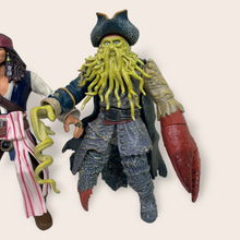 Load image into Gallery viewer, (2000’s) Pirates Of The Caribbean Disney Zizzle 7” Inch figures (Captain Jack Sparrow, Will Turner, Davy Jones)
